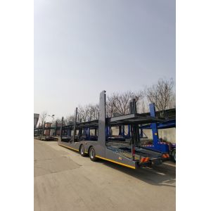 China Fully Enclosed Russia Hydraulic Lifting 2/3 Axle Car Transport Trailer with Triangle Tire on sale