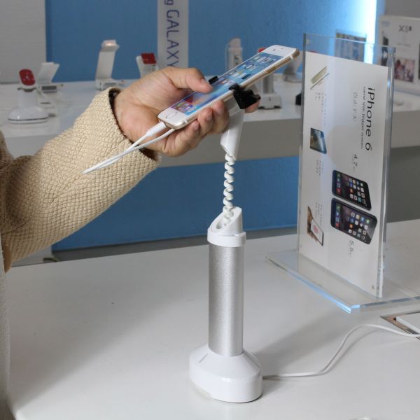 Comer mobile phone security stand with alarm sensor and charging cables for