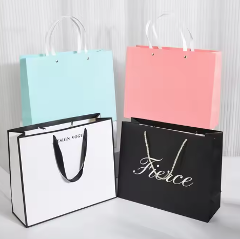 Buy cheap Custom Printed White Paper Gift Bags with Ribbon Handles from wholesalers
