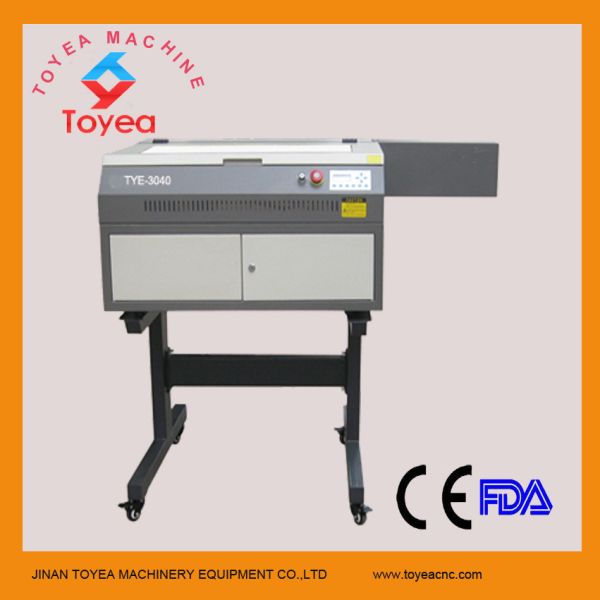 Quality mini laser engraving machine with support stand TYE-3040 for sale