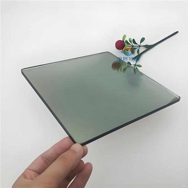 Buy cheap Light Green Reflective Clear Float Glass with 3 Years Warranty and 91.5 Transmittance for Hotel and Office Window Decoration from wholesalers