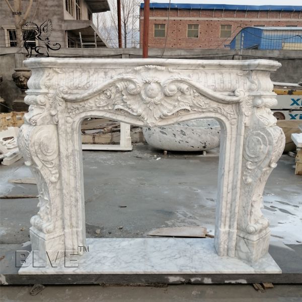 Quality Carrara Marble Fireplace Modern Hand Carved Freestanding Fireplaces European Style for sale