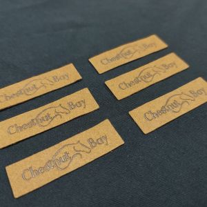 Buy cheap Custom Garment Accessories Suede Microfiber PU Leather Label With Debossed Logo for Shoes Clothes Bags from wholesalers